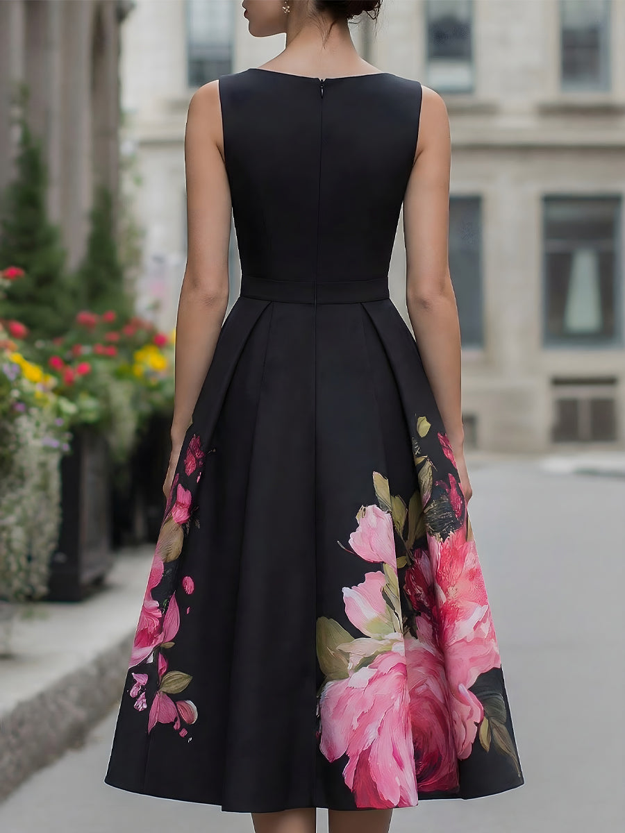 Elegant ærmeløs midikjole med blomsterprintet skørt