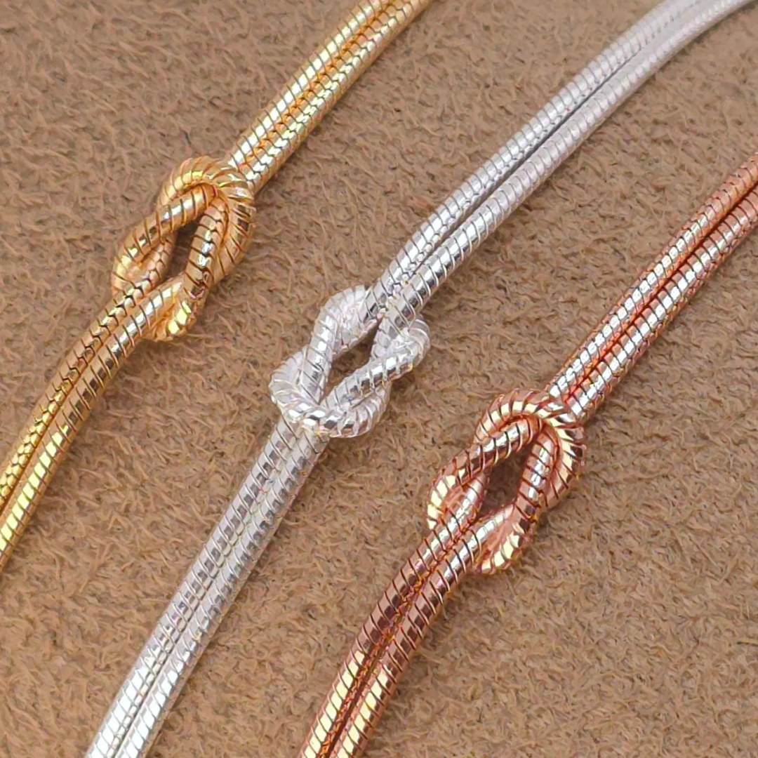 Eternal Knot-armbånd | Støt kampen mod brystkræft (1+1 GRATIS)