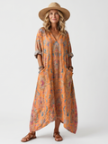 Remi | Oversized midi-kjole med udskåret hals, print og lommer