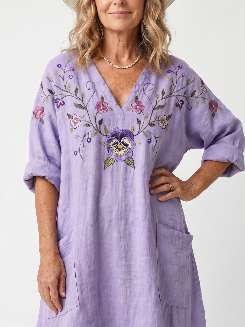 Tavi | Midi-kjole i oversize-størrelse med blomsterbroderi og store lommer