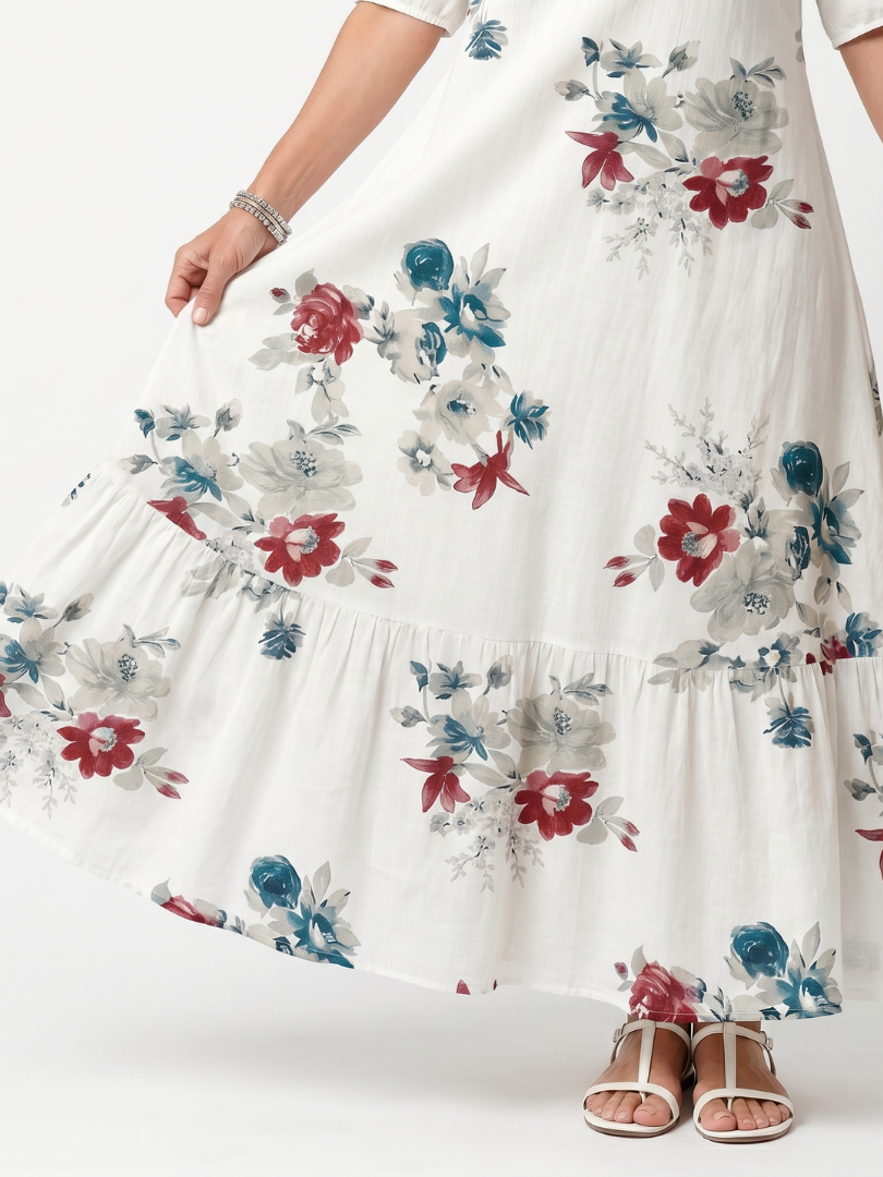 Maeva | Midi-kjole med spredt blomstermønster og kvaster