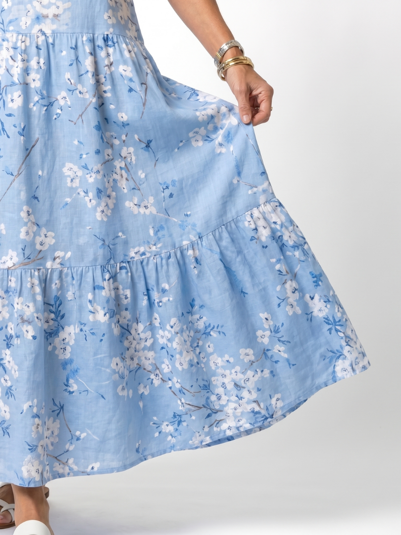 Alora | Midikjole med blomsterprint og kvaster