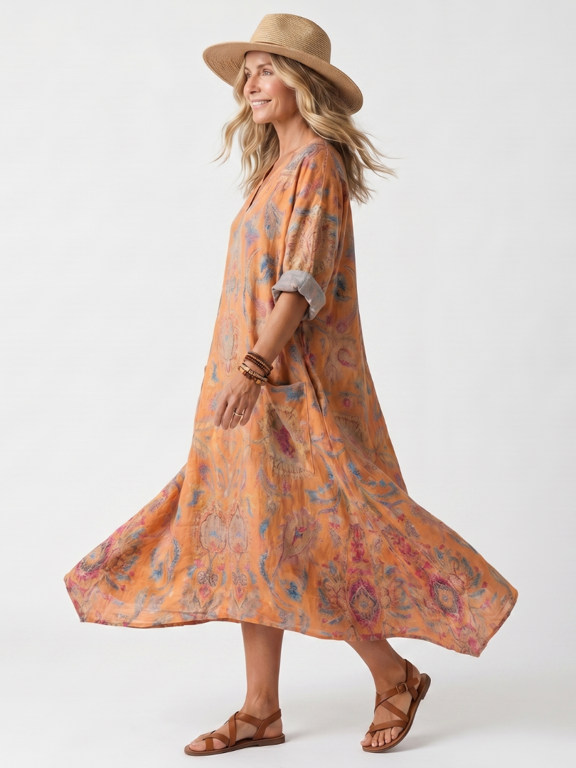 Remi | Oversized midi-kjole med udskåret hals, print og lommer