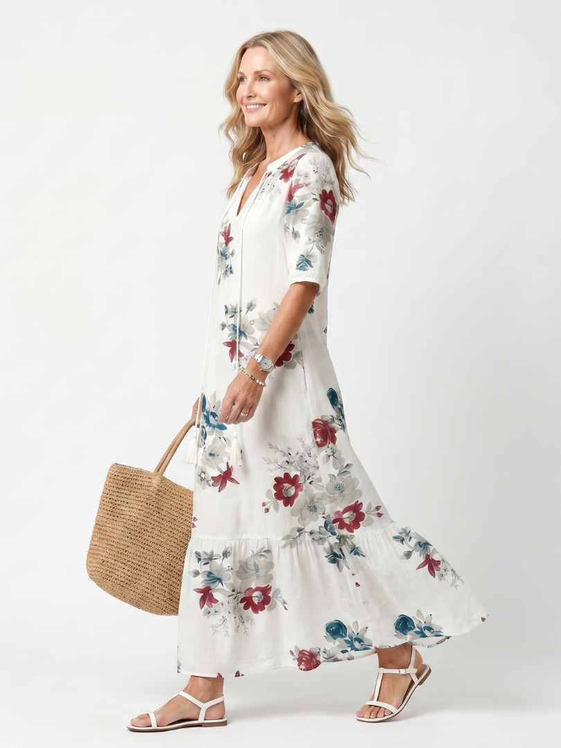 Maeva | Midi-kjole med spredt blomstermønster og kvaster