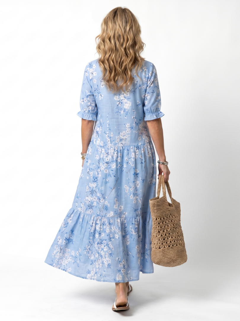 Alora | Midikjole med blomsterprint og kvaster
