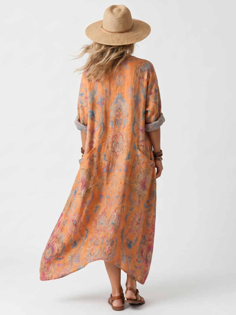 Remi | Oversized midi-kjole med udskåret hals, print og lommer