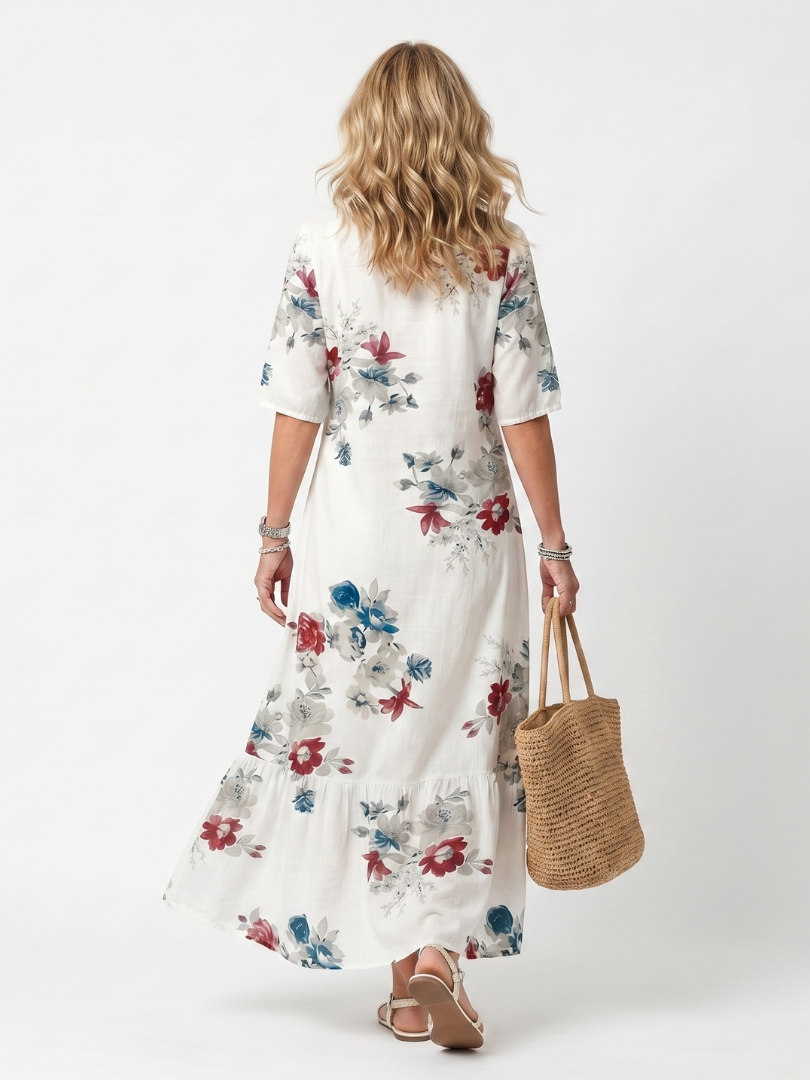Maeva | Midi-kjole med spredt blomstermønster og kvaster