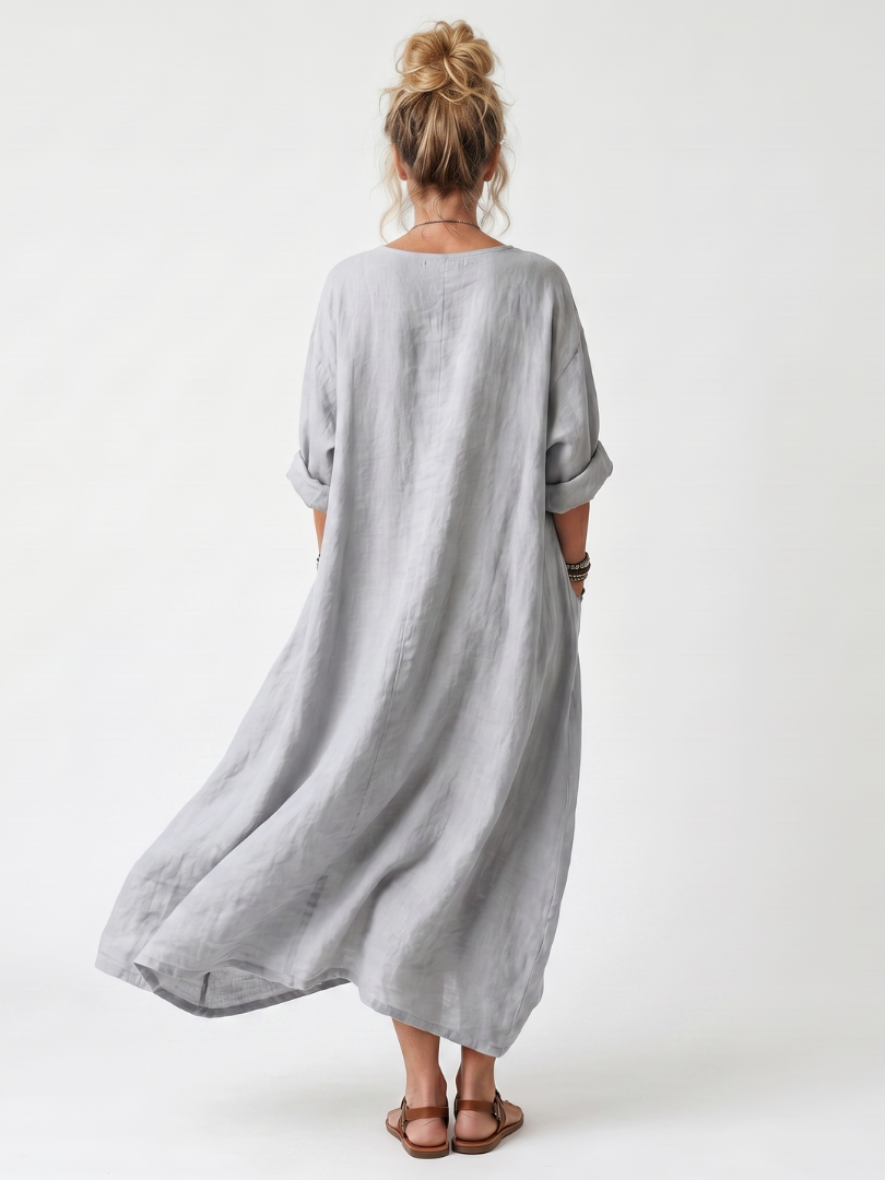 Raina | Midi-kjole med kontrastpaneler og broderet, oversized lomme