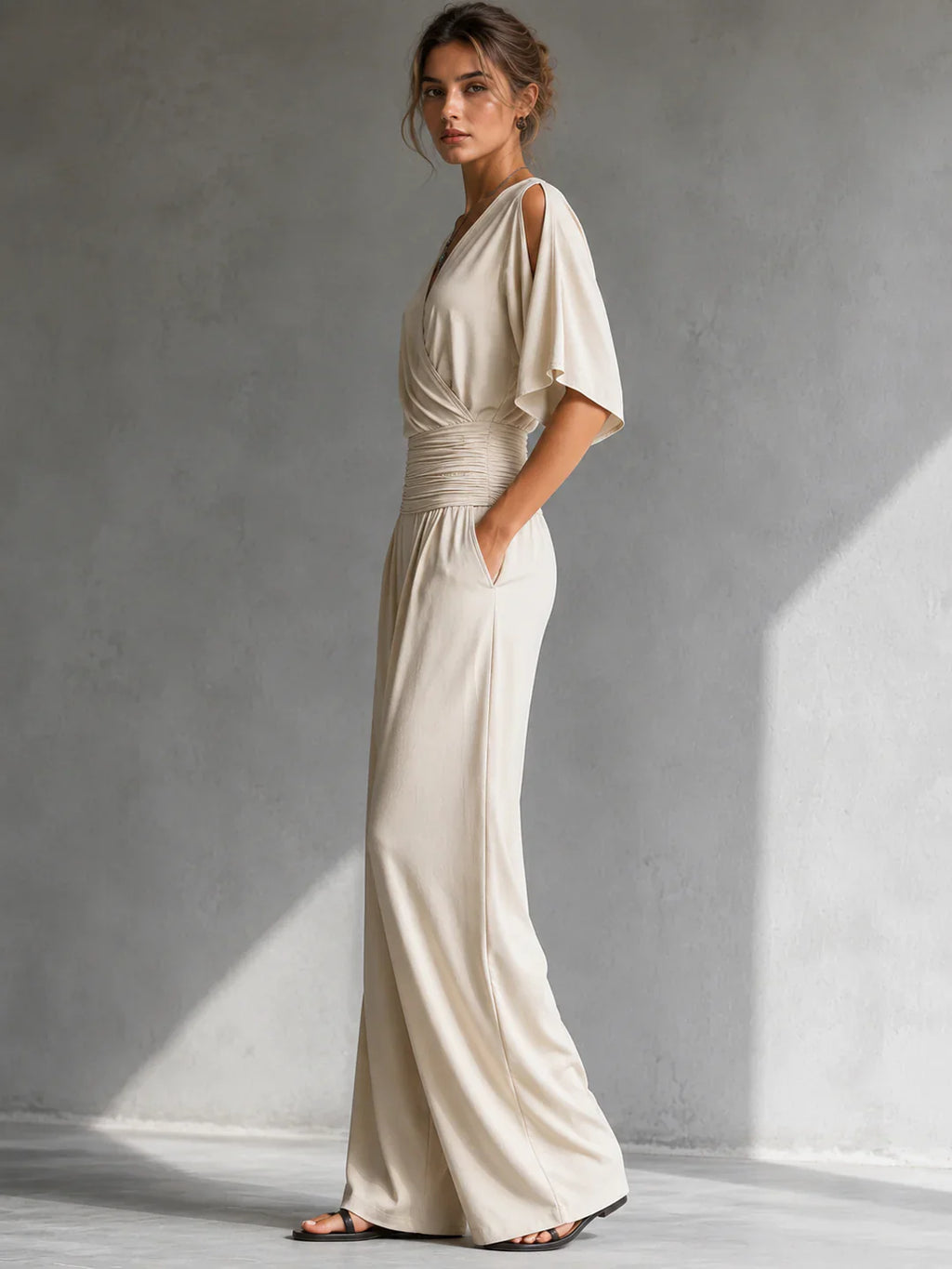 Alia | Elegant jumpsuit med wrap-look og brede ben