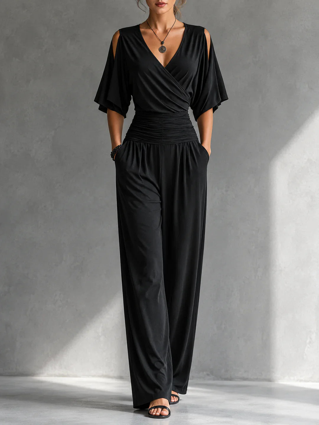 Alia | Elegant jumpsuit med wrap-look og brede ben