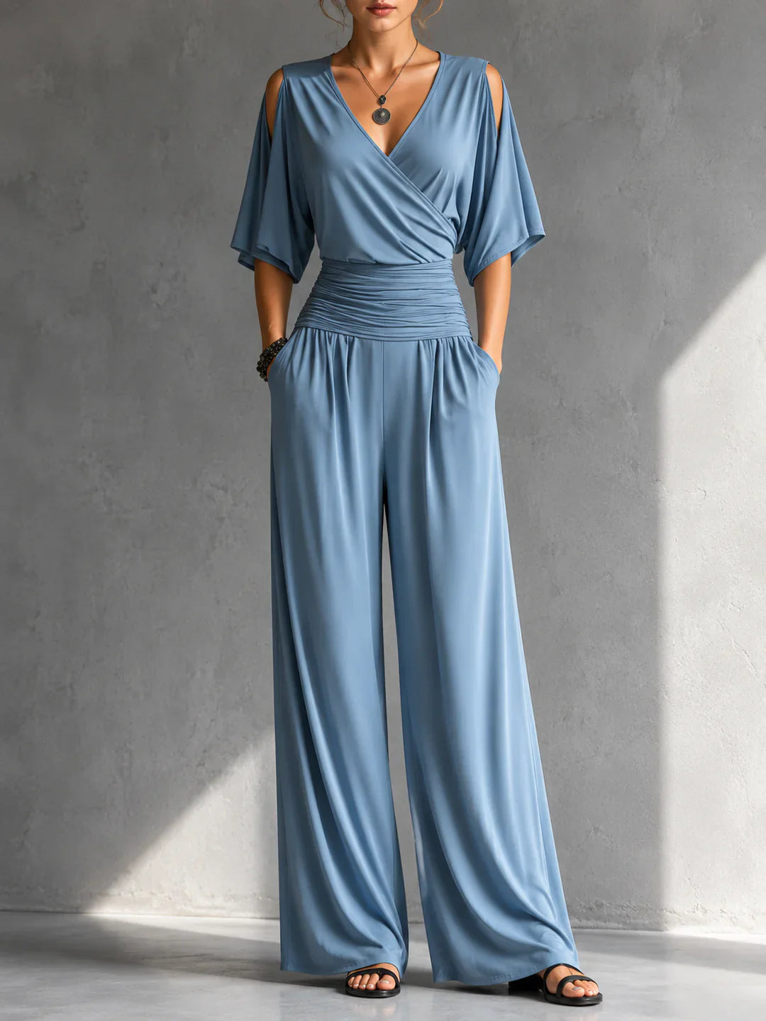Alia | Elegant jumpsuit med wrap-look og brede ben