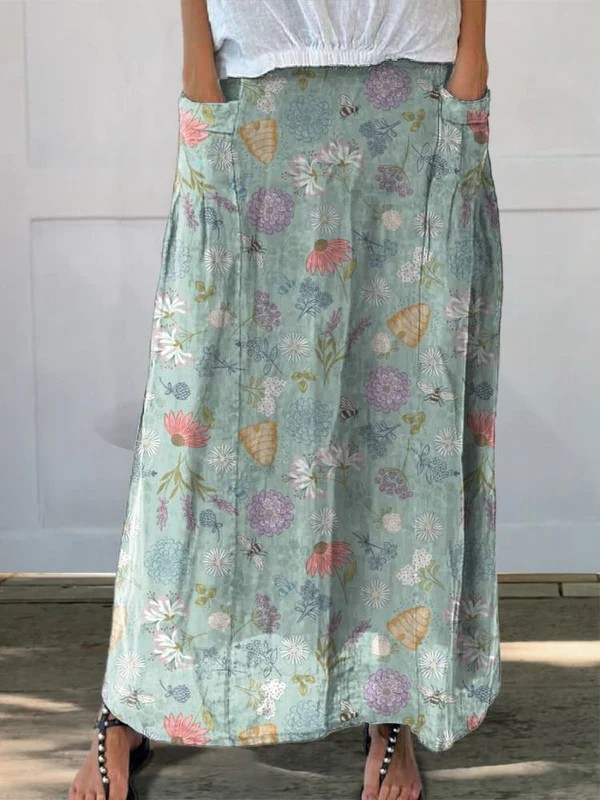 Daisy™ | Forårsnederdel med blomster- og humlebimønster