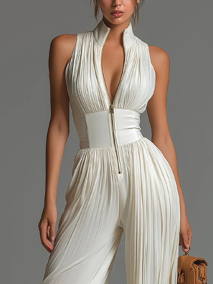 ÉLAN - Skulpturelt plisseret jumpsuit