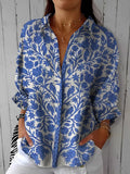 Vivienne – Blå bluse med blomsterprint