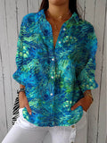Patricia – Blå bluse med naturmotiv