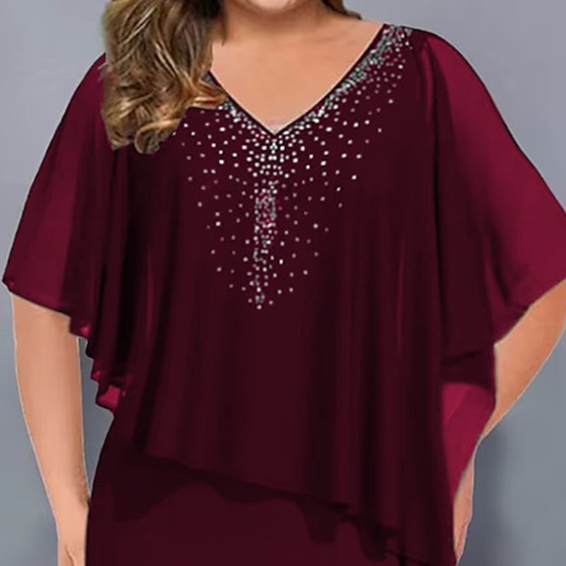 Vivia – Elegant capekjole med rhinsten