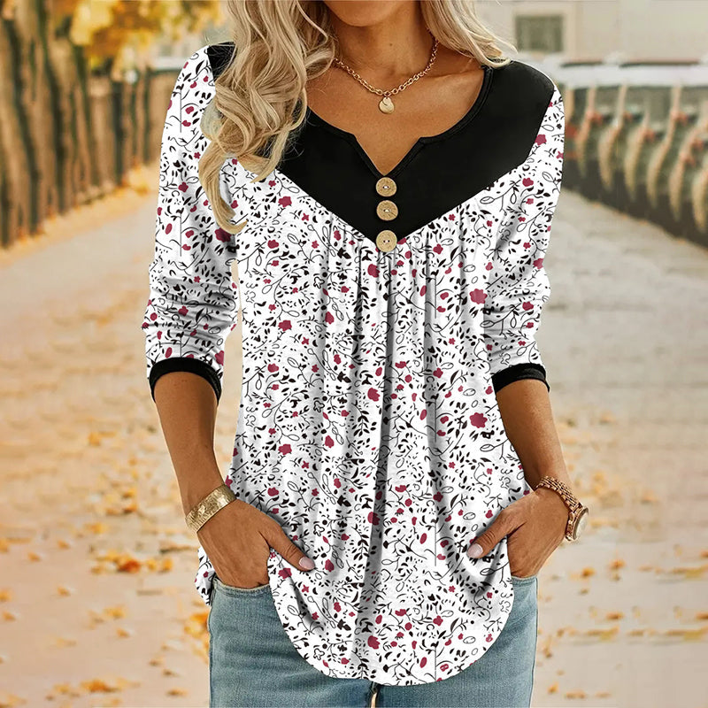 Eydis – Blomstret bluse med V-hals